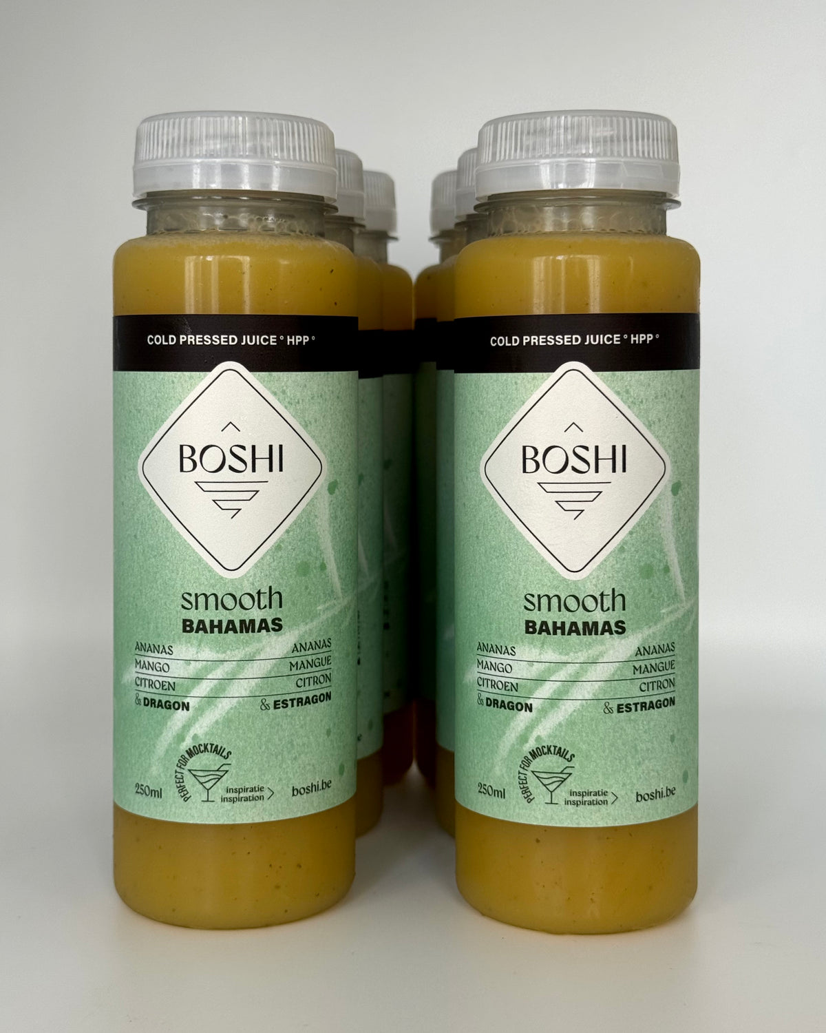 Zes flesjes Boshi Bahamas van 250 ml, koudgeperst sap met ananas en mango